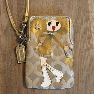 Coach Poppy Chan Goldy Wristlet in the Special Edition Poppy Chan Collection Y2K